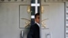 FILE - A security guard walks in the Saudi Arabia consulate in Istanbul, Oct. 9, 2018. 