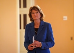 U.S. Senator Lisa Murkowski (R-AK) returns from a break during the Trump impeachment trial in Washington, Jan. 31, 2020.