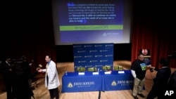 Dorry Segev, left, and Morris Murray, previous liver transplant recipient, are interviewed about the first ever HIV-positive liver transplant in the world after a news conference at Johns Hopkins hospital, March 30, 2016 in Baltimore.
