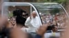 Pope Tones Down Anti-Capitalist Rhetoric 