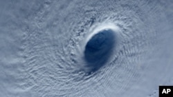 This image taken March 31, 2015 shows Typhoon Maysak taken by astronaut Samantha Cristoforetti from the International Space Station. 