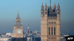A picture shows the Elizabeth Tower, commonly known as Big Ben, at the Palace of Westminster in London on Janurary 13, 2022. - British security services have warned MPs that a suspected Chinese agent "knowingly engaged in political interference activities