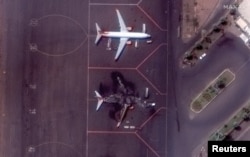Satellite image shows a destroyed Ukrainian airplane at Khartoum International Airport