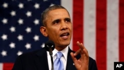 Presiden Barack Obama saat memberikan pidato kenegaraan di hadapan para anggota Kongres Amerika di Washington DC (28/1).