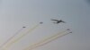 Des avions militaires survolent la capitale de la Birmanie, Naypyitaw, le 27 mars 2017.