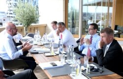 FILE - President of the European Council Charles Michel meets with prime ministers of Czech Republic, Poland, Hungary and Slovakia during European Union Council over a post-virus economic rescue plan, in Brussels, Belgium, July 19, 2020.