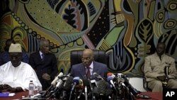 Senegal's President Abdoulaye Wade speaks to journalists at a news conference in Dakar, February 27, 2012. Wade was locked in a tight race with his main rival, Macky Sall, on Monday as unofficial vote tallies pointed to a possible run-off between the two 