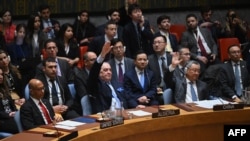 Dewan Keamanan PBB memberikan suara pada sebuah resolusi yang mengizinkan keanggotaan Palestina di PBB. Pengambilan suara tersebut berlangsung di markas besar PBB di New York dalam pertemuan Dewan Keamanan PBB yang membahas situasi di Timur Tengah, termasuk Palestina.(Foto: AFP)