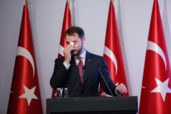 FILE - Turkish Finance Minister Berat Albayrak speaks during a conference to ease investor concerns about Turkey's economic policy, in Istanbul, Turkey, Nov. 8, 2020.