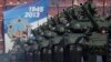 Russian tanks move along Red Square during a Victory Day parade, Moscow, May 9, 2013.