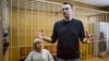 Russian Court Jails, Fines Opposition Leader Over Mass Protests