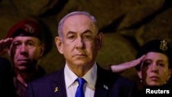 ILE PHOTO: Israeli Prime Minister Benjamin Netanyahu attends a wreath-laying ceremony marking Holocaust Remembrance Day in Jerusalem