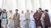 Pope Francis stands with religious leaders during an inter-faith meeting near the historic city of Ur, near Nasiriyah, Iraq, March 6, 2021. 