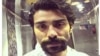 The mother of Iranian human rights activist Nader Afshari, seen in this undated photo shared on social media, says a court official has told her he was arrested, Aug. 1, 2018, for joining an antigovernment protest in Karaj, Iran.
