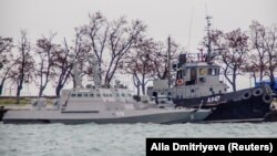 Ukrainian naval ships, which were recently seized by Russia's FSB security service, are seen anchored in a port in Kerch, Crimea November 28, 2018. REUTERS