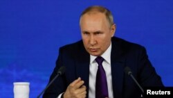 Ruski predsjednik Vladimir Putin govori na redovnoj konferenciji za novinare u Moskvi (Foto: Reuters/Evgenia Novozhenina)