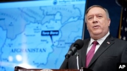 FILE - Secretary of State Mike Pompeo speaks at the National Press Club in Washington, Jan. 12, 2021. 