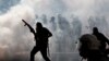 Turkish police clash with protestors at a May Day demonstration in Istanbul, May 1, 2013.