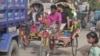 Rickshaws clog afternoon traffic in the busy border town of Teknaf, Bangledesh. Rohingya Muslims have been arriving in the area, fleeing persecution in Myanmar. (S. Sandford/VOA)