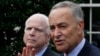 U.S. Senators Charles Schumer (D-NY), right, and John McCain (R-AZ), address media after White House immigration meetings, July 11, 2013.
