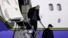 Matthew Miller, who had been held in North Korea since April 2014, walks off the plane after arriving at Joint Base Lewis-McChord, Washington, Nov. 8, 2014.