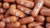 Pil pengobatan COVID-19 eksperimental yang disebut molnupiravir yang dikembangkan oleh Merck & Co Inc dan Ridgeback Biotherapeutics LP, terlihat dalam foto selebaran tak bertanggal yang dirilis oleh Merck & Co Inc dan diperoleh Reuters 17 Mei 2021. (Foto: Reuters)