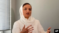 Zarifa Ghafari, former mayor of Maidan Shahr and Afghan women's rights activist, who arrived with her family in Cologne recently, speaks during an interview with the Associated Press at a hotel in Duesseldorf, Germany, Aug. 25, 2021.