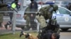 Police detain a man during an opposition rally to protest the official presidential election results in Minsk, Belarus, Nov. 1, 2020.