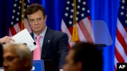 FILE - Paul Manafort appears on stage ahead of then-Republican presidential candidate Donald Trump, in New York, June 22, 2016.